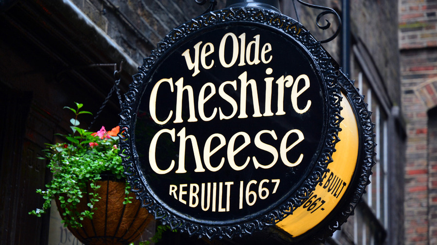 Sign of the Ye Olde Cheshire Cheese Pub in London, a historical travel spot.