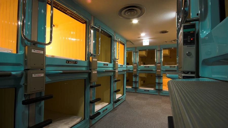 Capsule hotel interior in Tokyo for budget travelers - Tokyo Travel Guide