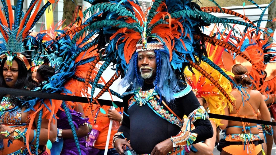 Person in vibrant costume at Notting Hill Carnival, London