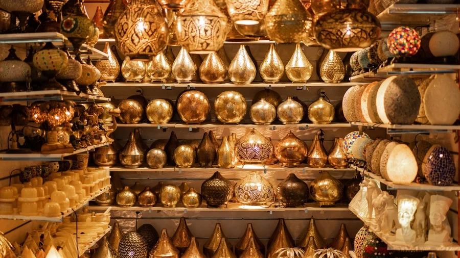 Decorative golden Arabic-style table lamps at Gold Souk in Dubai