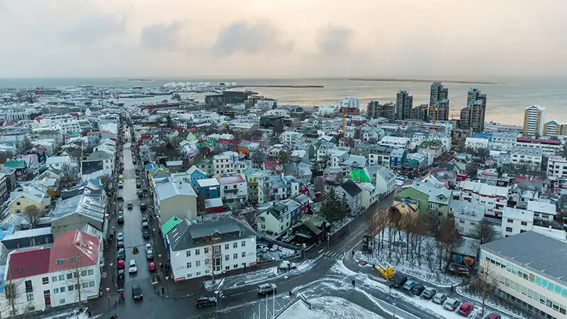 Aerial view of Reykjavik, Iceland covered in snow, perfect for a 3-day travel itinerary.