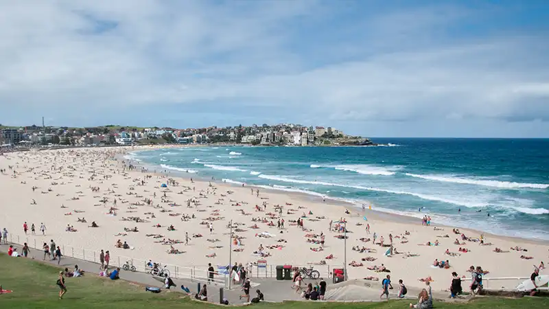 Sunny day at Bondi Beach, a highlight in any Sydney travel guide.