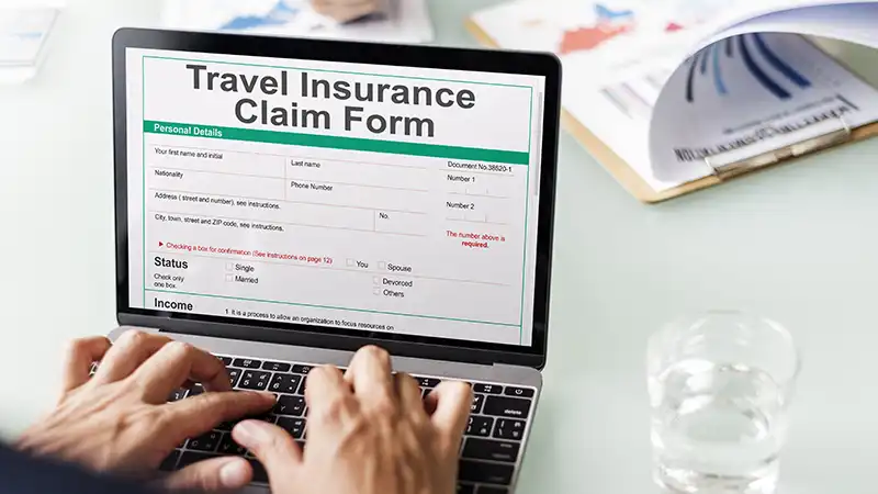 Travel insurance claim form highlighting the importance of having a policy for unforeseen travel events, questioning if travel insurance is necessary.