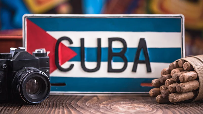 Travel essentials for a safe trip to Havana, Cuba, depicted in a concept image.