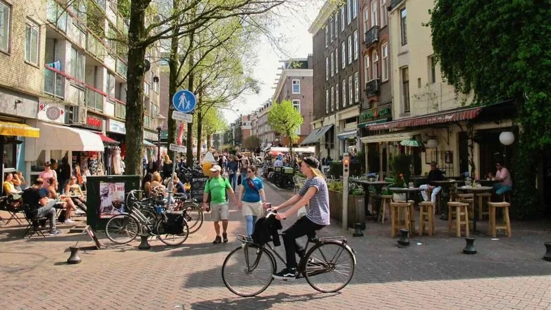 Bohemian vibe of De Pijp's vibrant streets, a highlight in Amsterdam's cultural experiences.