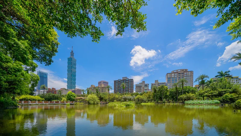 Scenic summer view of Taipei, showcasing the vibrant cityscape and lush greenery.