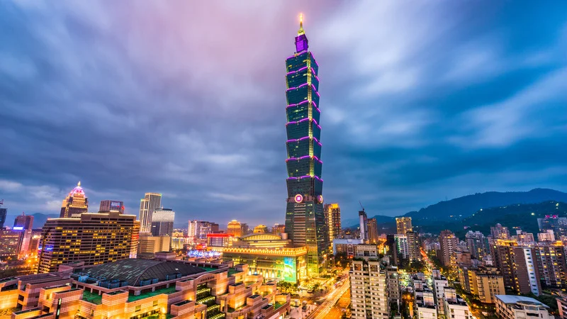 Taipei 101 towering over the city's night skyline, a must-see for visitors in Taipei.